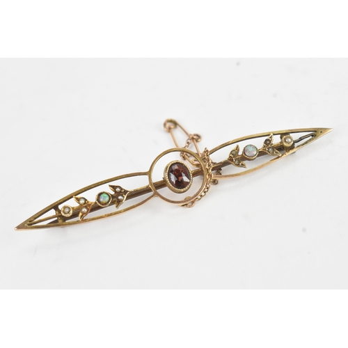 33 - Three 19th century/early 20th century brooches, to include a 9ct yellow gold opal and seed pearl bar... 