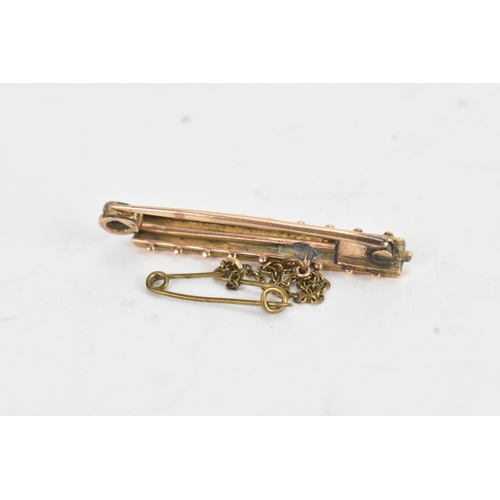 33 - Three 19th century/early 20th century brooches, to include a 9ct yellow gold opal and seed pearl bar... 