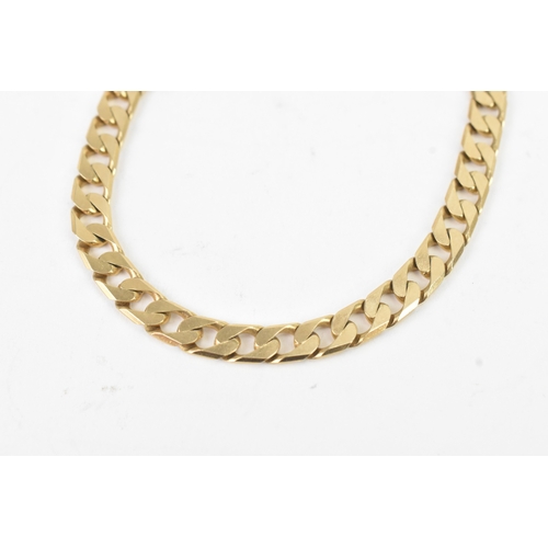 39 - A 9ct yellow gold flat link bracelet having a lobster claw clasp, stamped 375, 21ckm long, weight 12... 