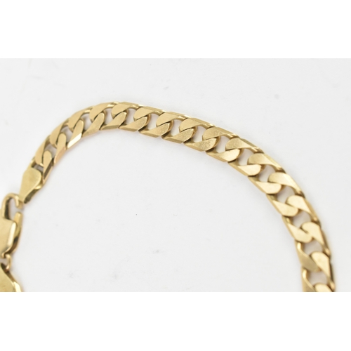 39 - A 9ct yellow gold flat link bracelet having a lobster claw clasp, stamped 375, 21ckm long, weight 12... 