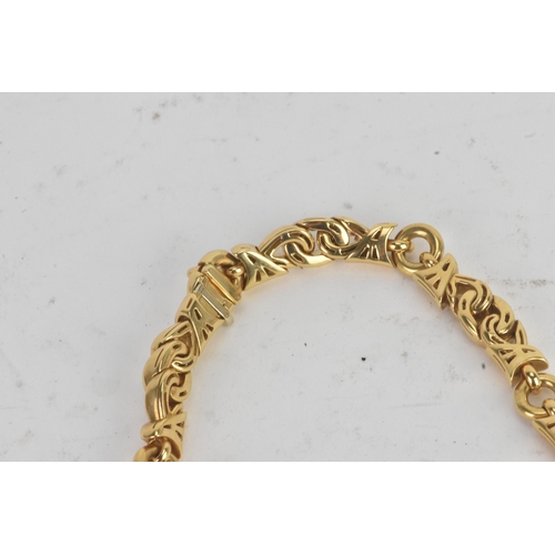 4 - A Bulgari ‘Doppio Cuore’ 18ct gold and diamond necklace, designed as a series of polished interwoven... 