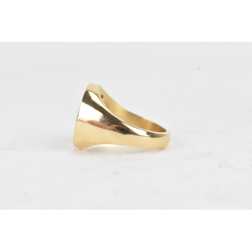 41 - A modern three stone diamond 10k yellow gold signet ring, engraved monogram letter 'M' and three ver... 