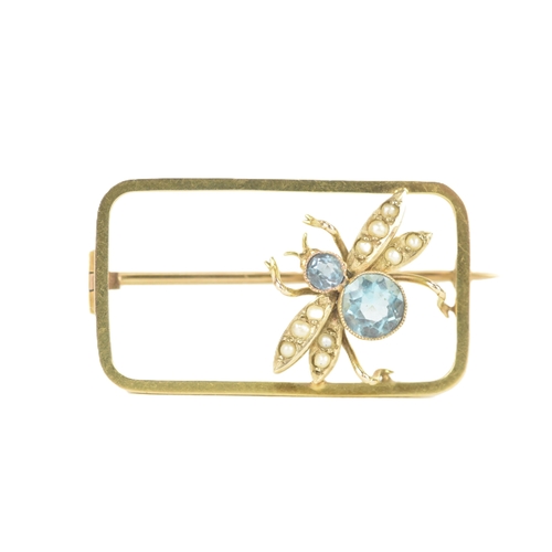 43 - A Edwardian 9ct yellow gold insect brooch, with two graduated bezels set with faceted stones, making... 