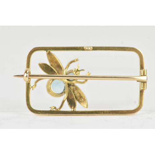 43 - A Edwardian 9ct yellow gold insect brooch, with two graduated bezels set with faceted stones, making... 