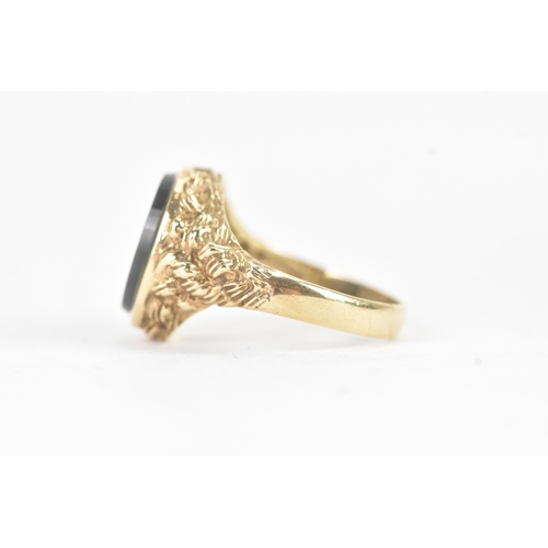 47 - A 9ct yellow gold signet ring, set with oval cut bloodstone intaglio, engraved with female profile, ... 