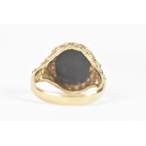 47 - A 9ct yellow gold signet ring, set with oval cut bloodstone intaglio, engraved with female profile, ... 