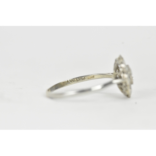 48 - A diamond 18ct white gold and platinum daisy ring, featuring a central bezel set brilliant round cut... 