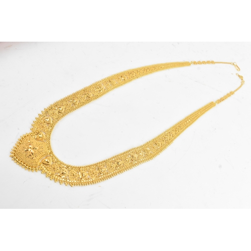 5 - A yellow gold filigree necklace and matching pair of drop earrings, testing as 20-22ct gold, the nec... 