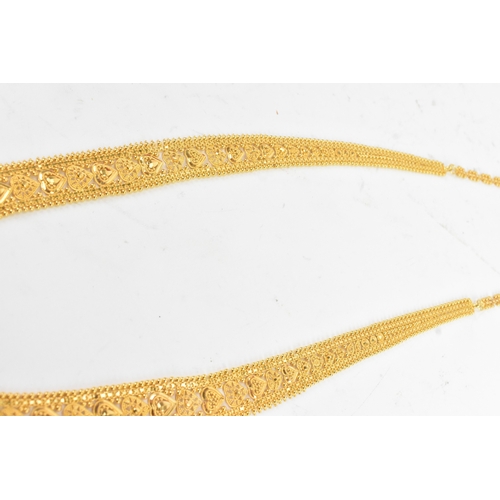 5 - A yellow gold filigree necklace and matching pair of drop earrings, testing as 20-22ct gold, the nec... 