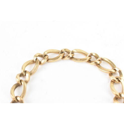 50 - A 9ct yellow gold curb link bracelet with a heart shaped padlock clasp, stamped 375, with British ha... 