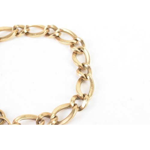 50 - A 9ct yellow gold curb link bracelet with a heart shaped padlock clasp, stamped 375, with British ha... 