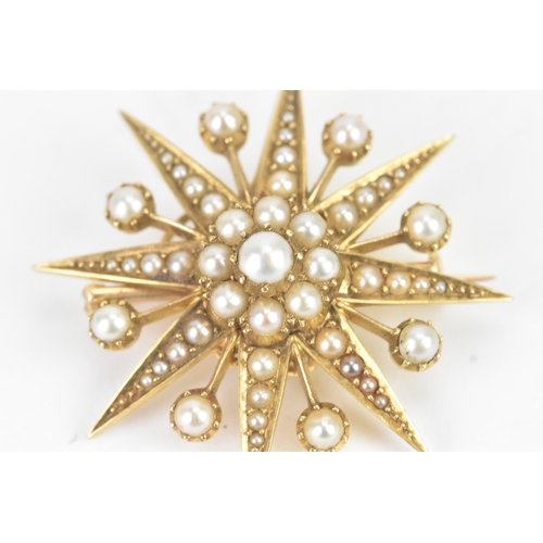 51 - A Victorian celestial pearl and yellow metal starburst brooch/pendant tested as 18ct gold, features ... 