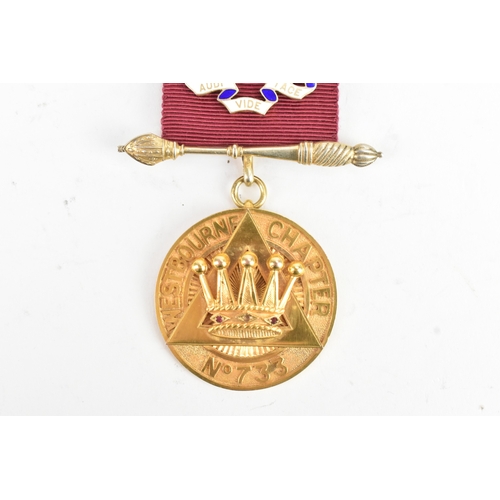 52 - A 9ct yellow gold Masonic Jewel the ribbon-mounted suspension with crossed sceptres, helmet and blue... 