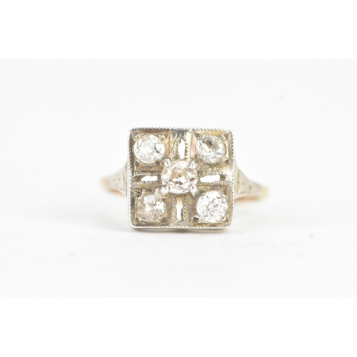56 - A Victorian diamond cluster ring featuring five old cut diamonds, arranged in a geometric design, wi... 