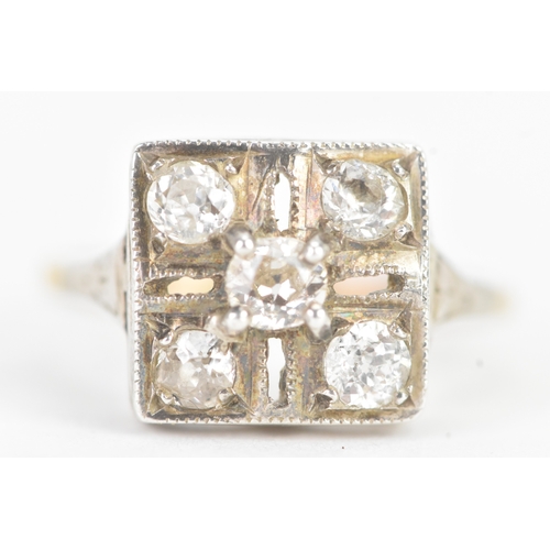 56 - A Victorian diamond cluster ring featuring five old cut diamonds, arranged in a geometric design, wi... 