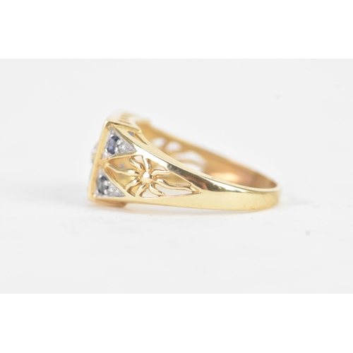 57 - A modern blue sapphire and diamond 14ct yellow and white gold cluster ring, featuring four round cut... 