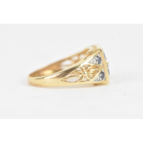 57 - A modern blue sapphire and diamond 14ct yellow and white gold cluster ring, featuring four round cut... 