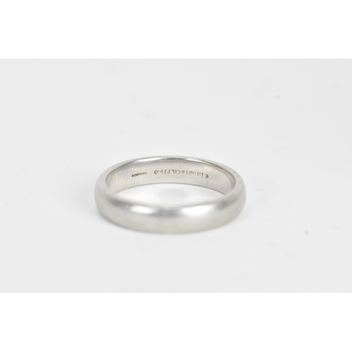 7 - A Tiffany platinum wedding band, with outer presentation box, size S 1/2, 9.4 grams
If there is no c... 