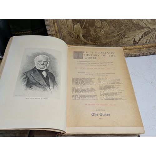 39 - A mixed group to include an oak wall hanging barometer, books to include The Historians History of t... 