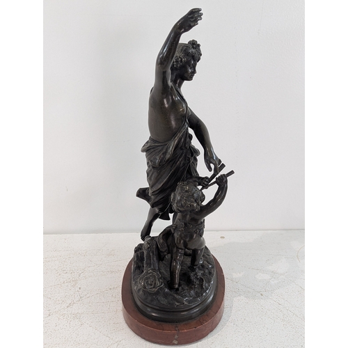 45 - A European bronze Bacchante and Putto sculpture on marble base, 36.5cmH
Location: R2.1
If there is n... 