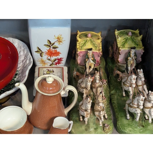 51 - A large mixed group of ceramics to include a set of three horse and carriage figural groups, Noritak... 