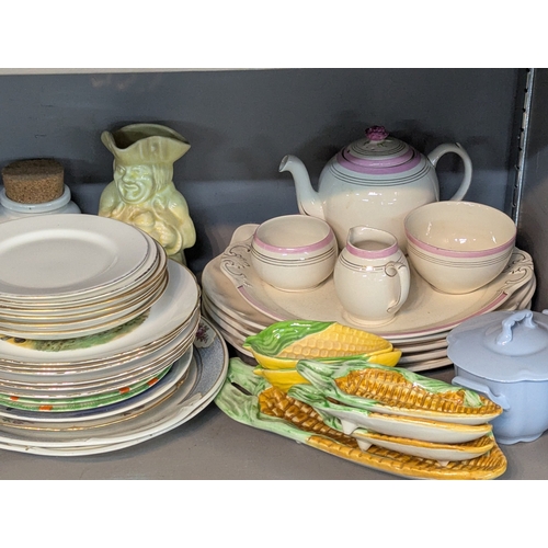 52 - A large mixed group of ceramics to a fine piece tea service, floral butter dish, cups, saucers and o... 