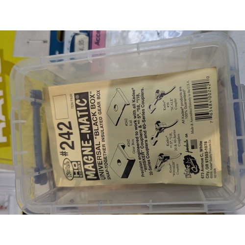 60 - A large collection of 00/HO gauge model railway hobby accessories, kits, parts, mainly by Hornby, ma... 
