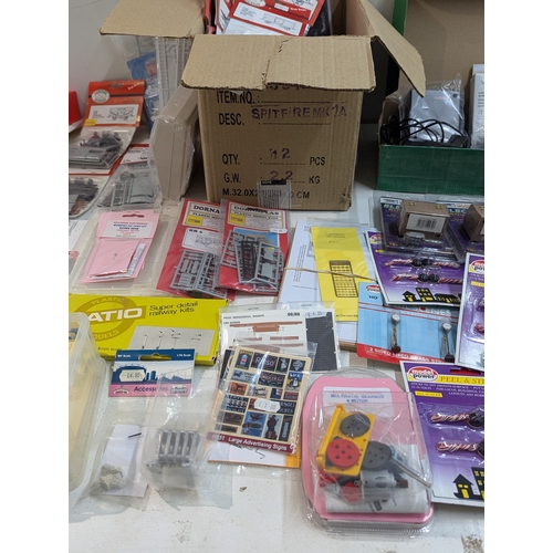 60 - A large collection of 00/HO gauge model railway hobby accessories, kits, parts, mainly by Hornby, ma... 