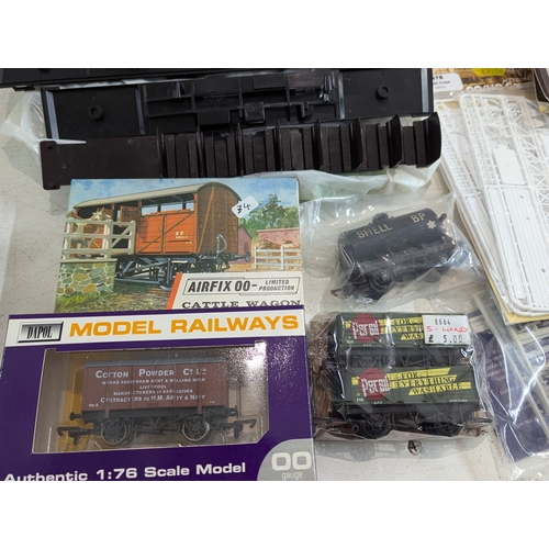 60 - A large collection of 00/HO gauge model railway hobby accessories, kits, parts, mainly by Hornby, ma... 