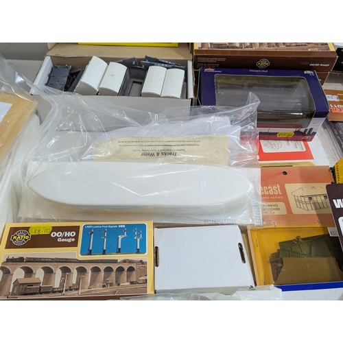 60 - A large collection of 00/HO gauge model railway hobby accessories, kits, parts, mainly by Hornby, ma... 