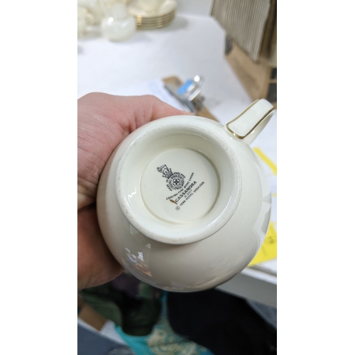 13 - A Royal Doulton Cassandra pattern tea service
Location: 8.2
If there is no condition report shown, p... 