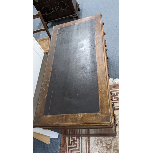 3 - A Victorian walnut twin pedestal desk having a leather topped scriber and nine drawers, 70.5h and 11... 