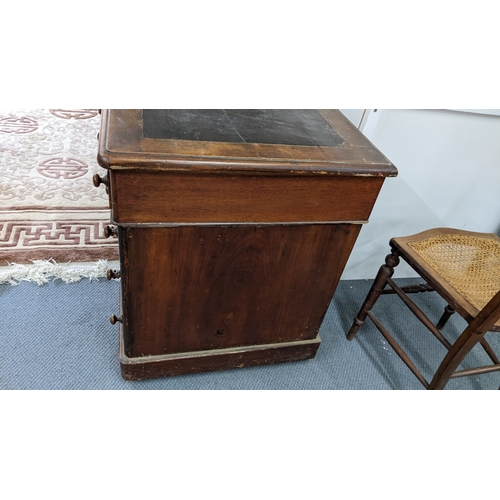 3 - A Victorian walnut twin pedestal desk having a leather topped scriber and nine drawers, 70.5h and 11... 