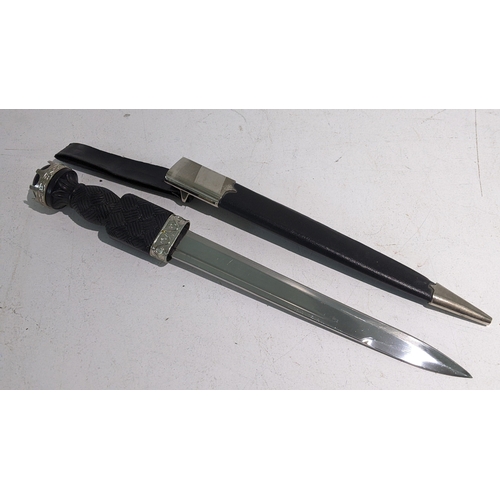 31 - A 20th Century Scottish dirk with leather scabbard
Location: RWM
If there is no condition report sho... 
