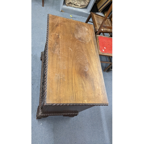 4 - A George V mahogany cabinet having a single drawer above two cupboard doors, 74H x 82W
Location: A4B... 