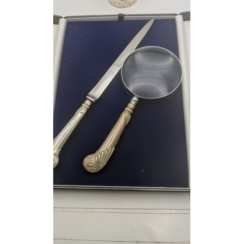 Silver to include a cased silver handled magnifying glass and letter ...