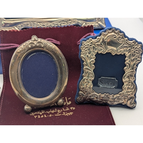 Four silver fronted easel back photograph frames, to include an ...
