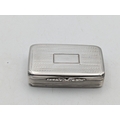 A William IV silver snuff box having engraved decoration, with central ...