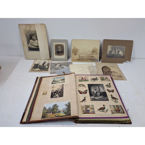 A Victorian scrapbook and photographs and a document letter relating to ...