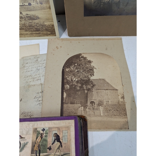 A Victorian scrapbook and photographs and a document letter relating to ...