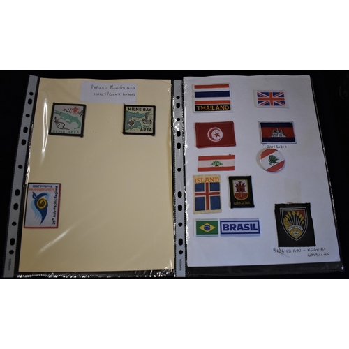 395 - Scouting An assortment of Jamboree badges including 2005 Japan (15) Papa New Guinea, Thailand, Cambo... 