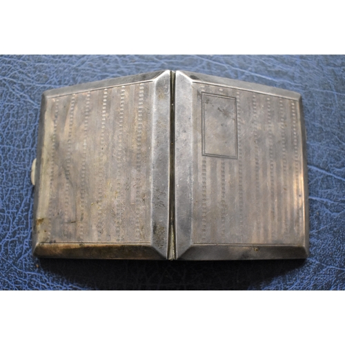 18 - Silver Cigarette Case made M. H. Meyer, Ltd, Clerkenwell Road, London, 1912-1936. A nice piece in go... 