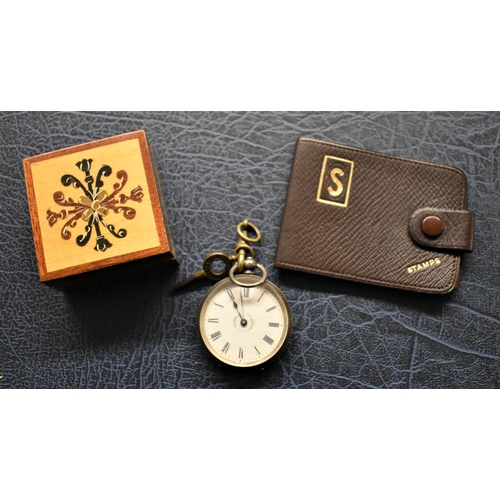 28 - Leather Stamp Case - A boxed ring, yellow and white stones, with a built in re-sizer, and a ladies s... 