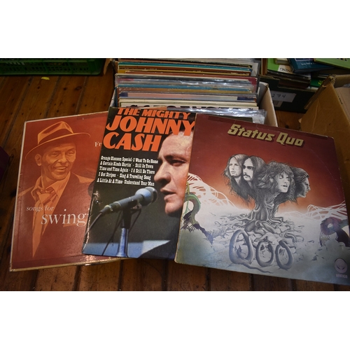 300 - Vinyl Collection in a box (60) Genres: Country and classical such as Jonny Cash, Nat King Cole, Wagn... 