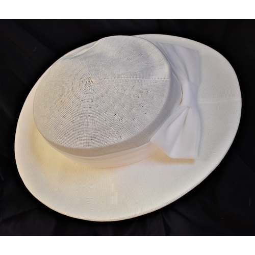 389 - Very nice lot containing (2) ascot hats, (1) hair band, and (1) hair piece. All cream / white in col... 