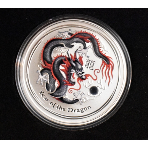 427 - Australia 2012 Silver Dollar, Year of the Dragon (Black and red Dragon) Mint, Boxed with certificate