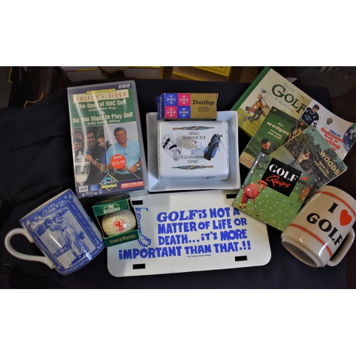 77 - A good selection of vintage golfing memorabilia mugs including a Guinness Butter plate, books, VHS t... 