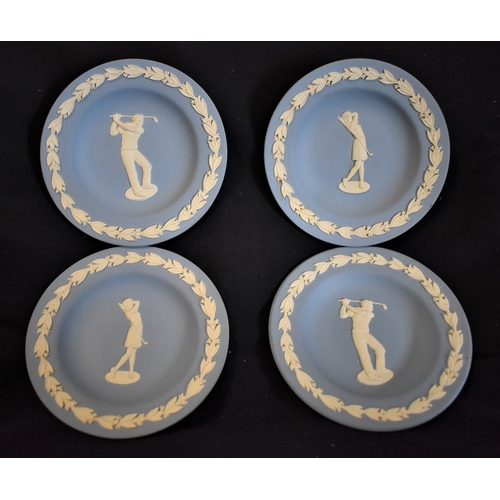 78 - (4) welded wood bon bon dishes depicting male and female golfers