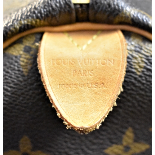 420 - Louis Vuitton Authentic Speedy 30 Monogram handbag. Used condition, but had no major wear. Padlock a... 