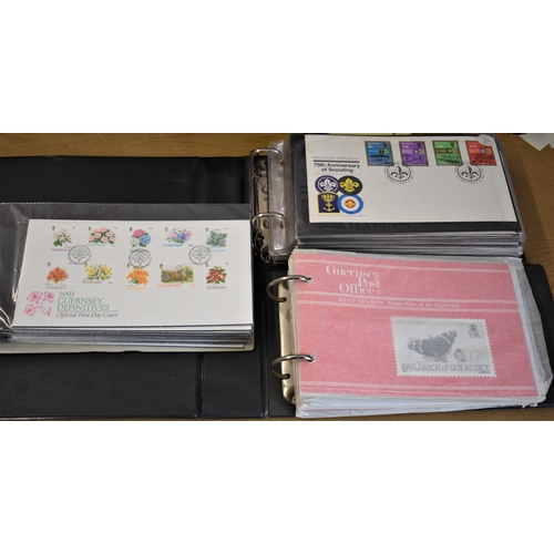 277 - Guernsey 1982-1993, A collection of packs & First Day Covers in three albums, values to £2. Several ... 